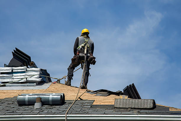 Professional Storm Damage Roof Repair technician working in Inverness, CO